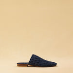 The Braided Mule COCO in Denim by LABEL17 blends artisanal craftsmanship with effortless elegance. Carefully hand-braided from premium washed cotton denim, it adds a unique texture to any look. The fine leather sole with a 1.5cm heel ensures comfort and a refined silhouette. Handmade in Morocco.