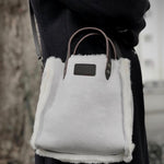 The Crossbody Bag Shearling Reversible MINI by LABEL17 in Winter Moss is made in Switzerland